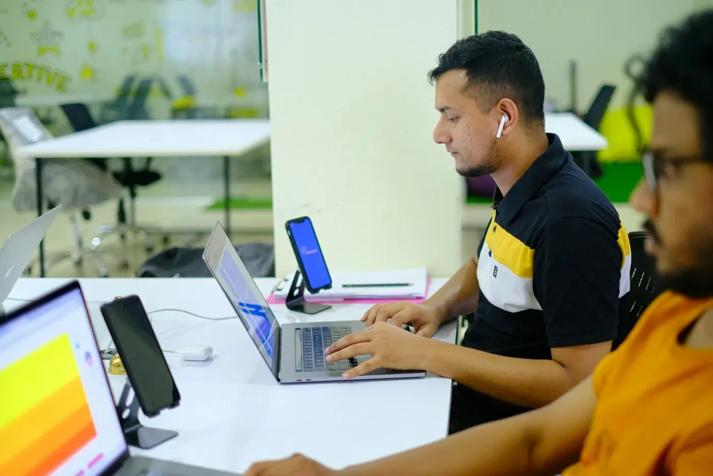 MarTech lead in a bright office, connecting Voxly Vision ad compliance checks to the team's tools